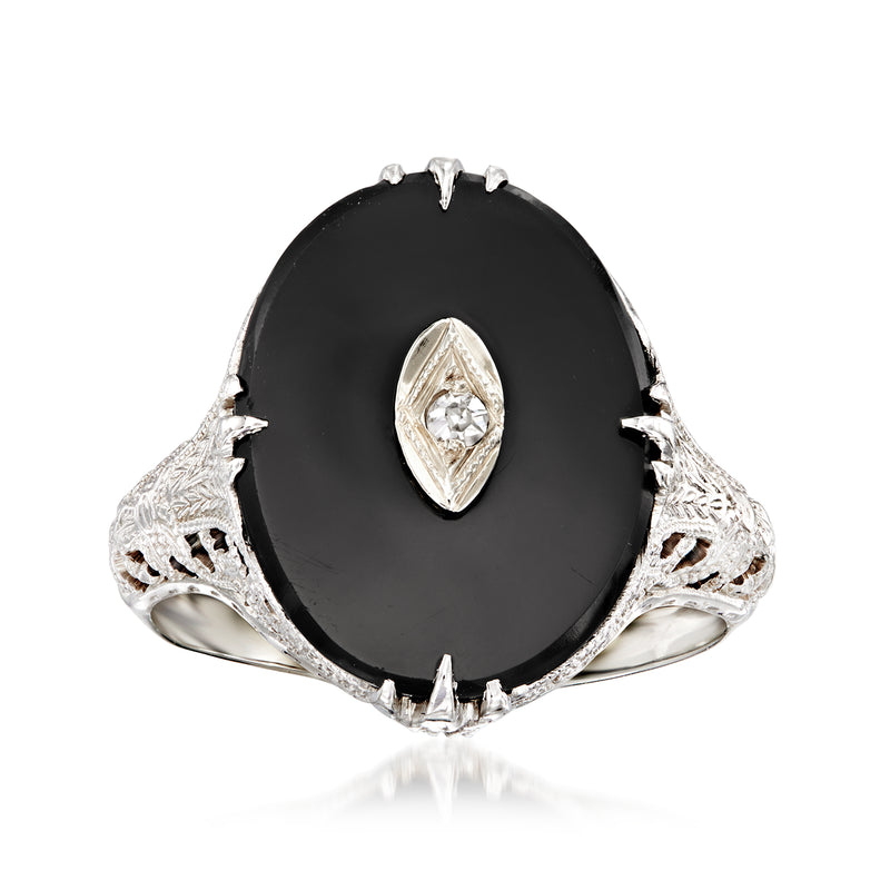 Vintage onyx oval ring in 14kt white gold with diamond accent and filigree shoulders