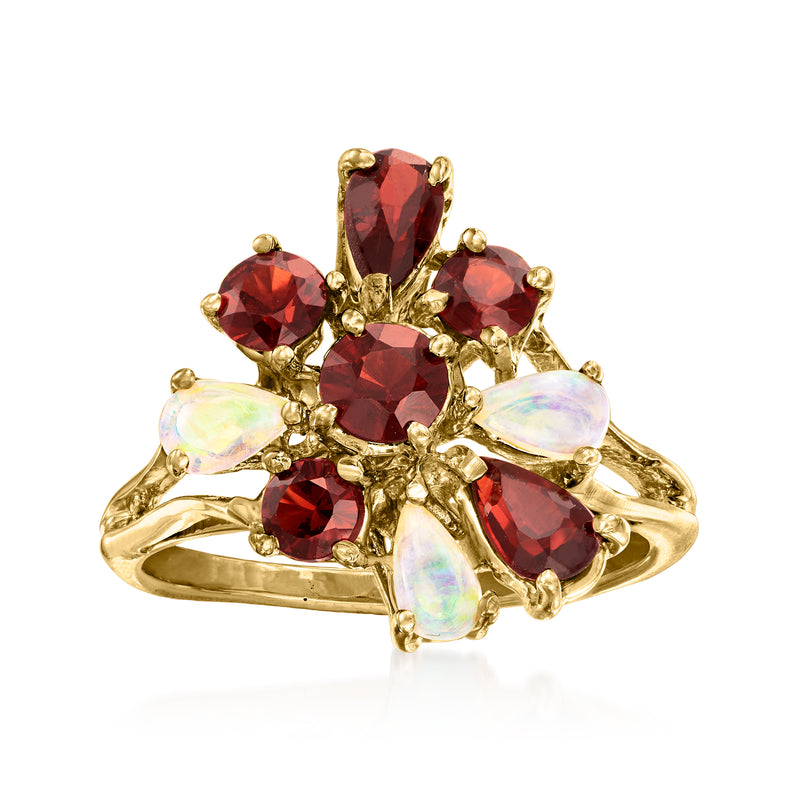 14kt yellow gold vintage ring with red garnet gemstones and oval opal accents