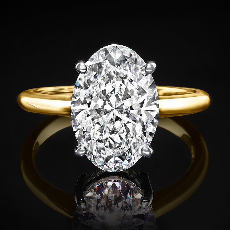 Oval lab-grown diamond solitaire ring, 14kt yellow gold band with four-prong setting