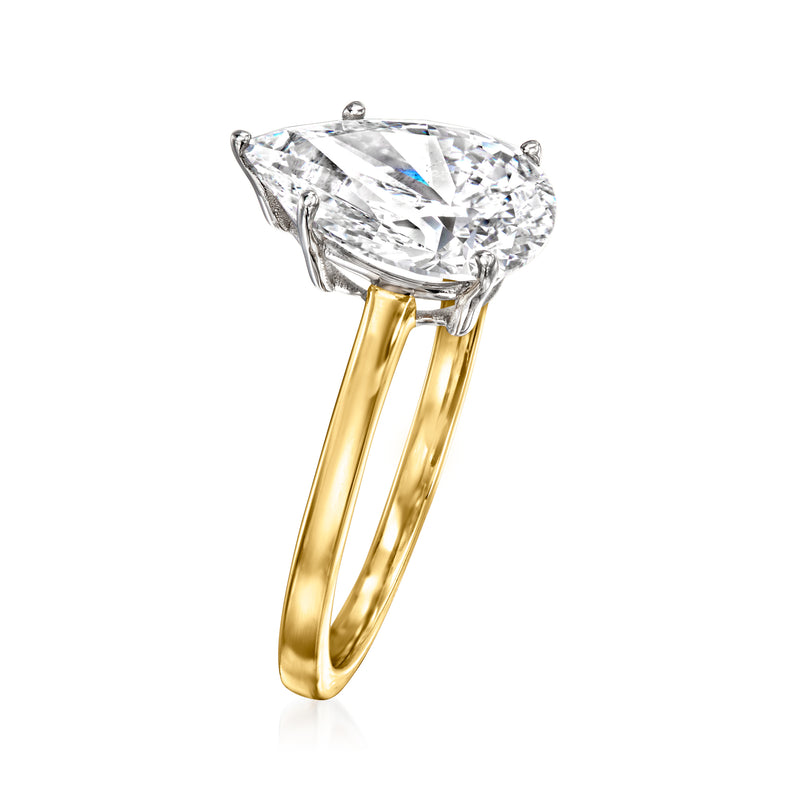 Pear-shaped diamond solitaire ring with prong setting on 14kt yellow gold band