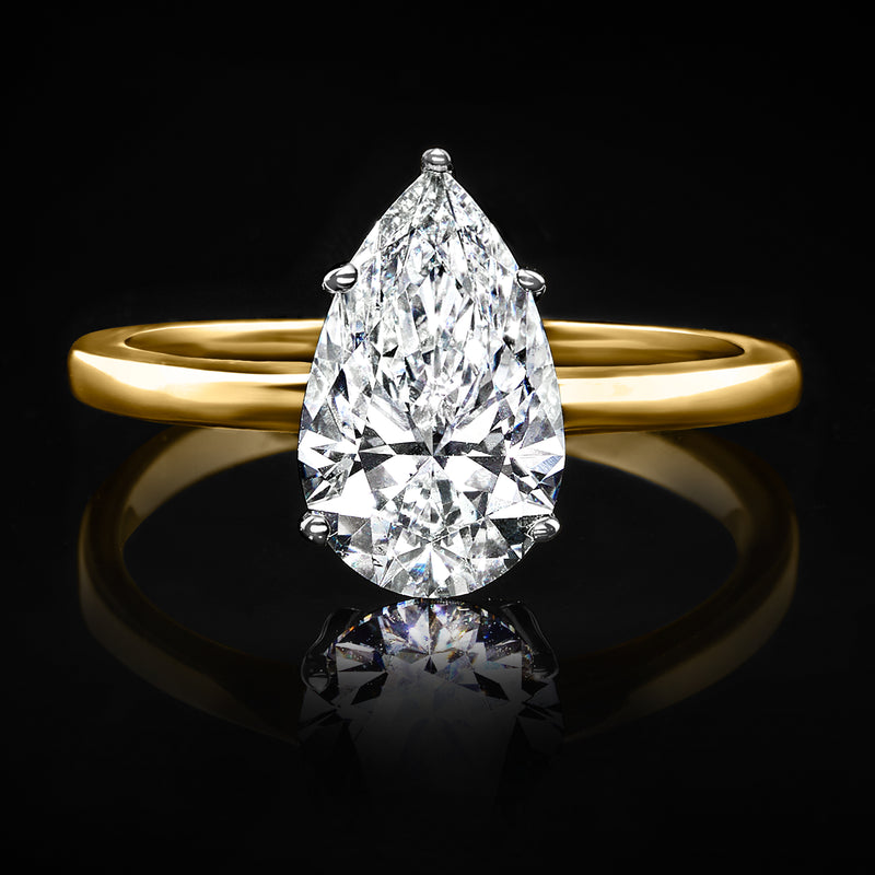 Pear-shaped diamond solitaire ring, 14kt yellow gold band and prong-set top