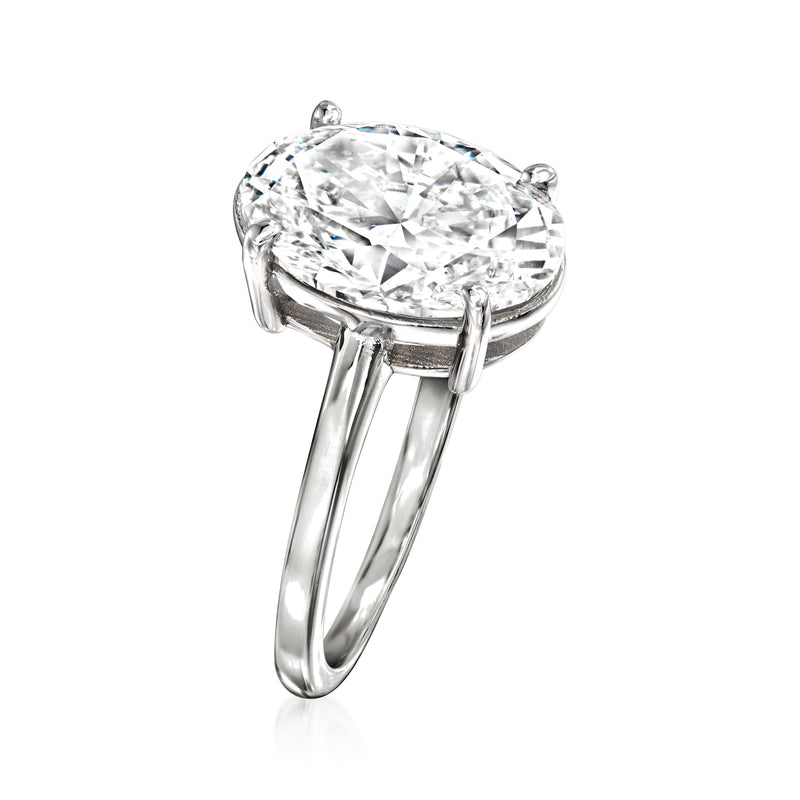 Oval lab-grown diamond solitaire ring in 14k white gold, angled view of four prongs