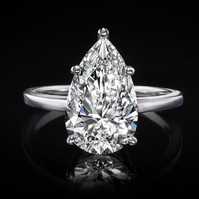 14kt white gold pear-shaped diamond solitaire ring with prong-set stone