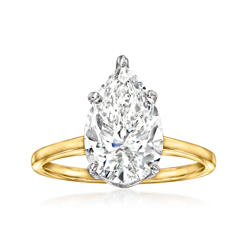 14kt yellow gold solitaire ring with pear-shaped clear diamond in 4-prong setting