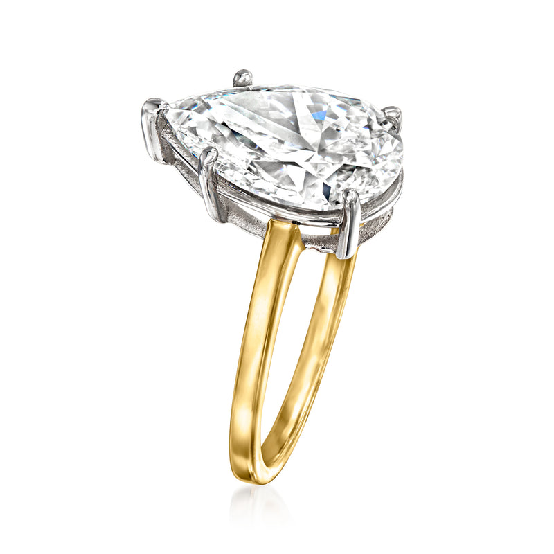 Pear-shaped diamond solitaire ring in 14kt yellow gold with side view of prongs