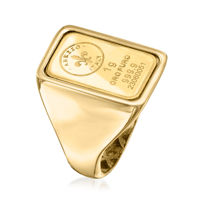 Yellow gold fleur-de-lis signet ring, angled view of engraved square stamp.