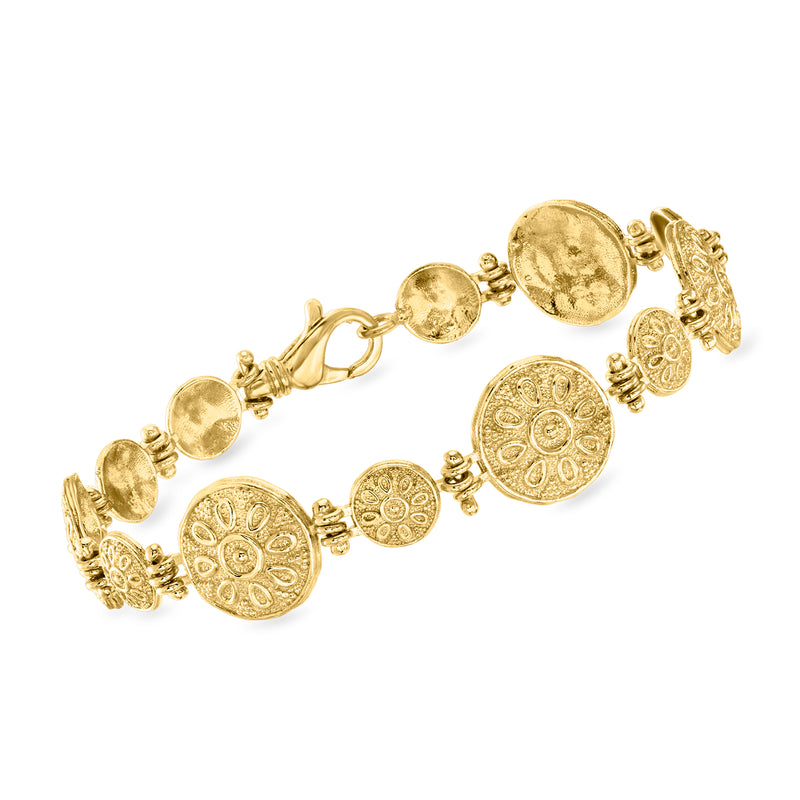 Gold-tone Etruscan-style bracelet with round disc charms and hinged clasp