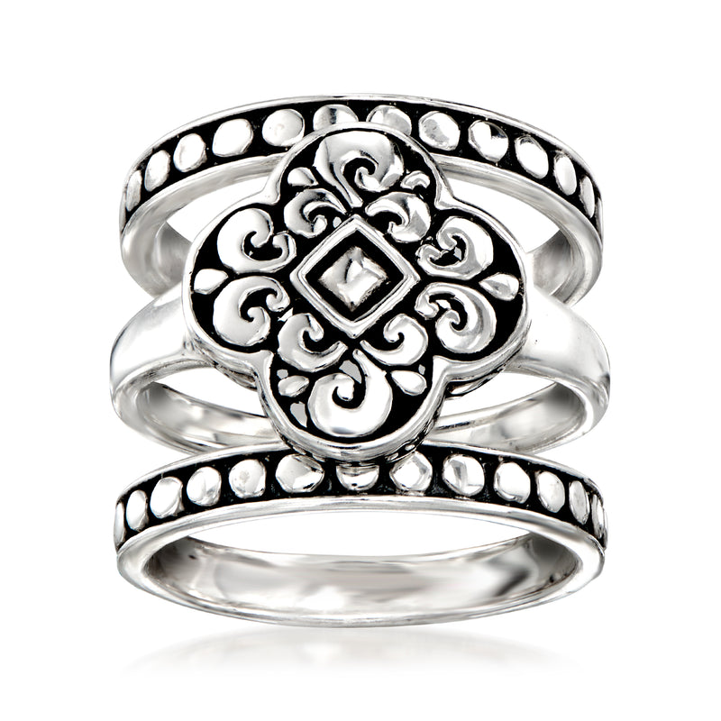 Sterling silver Bali-style ring set with two ornate rings, square filigree center, bead edge