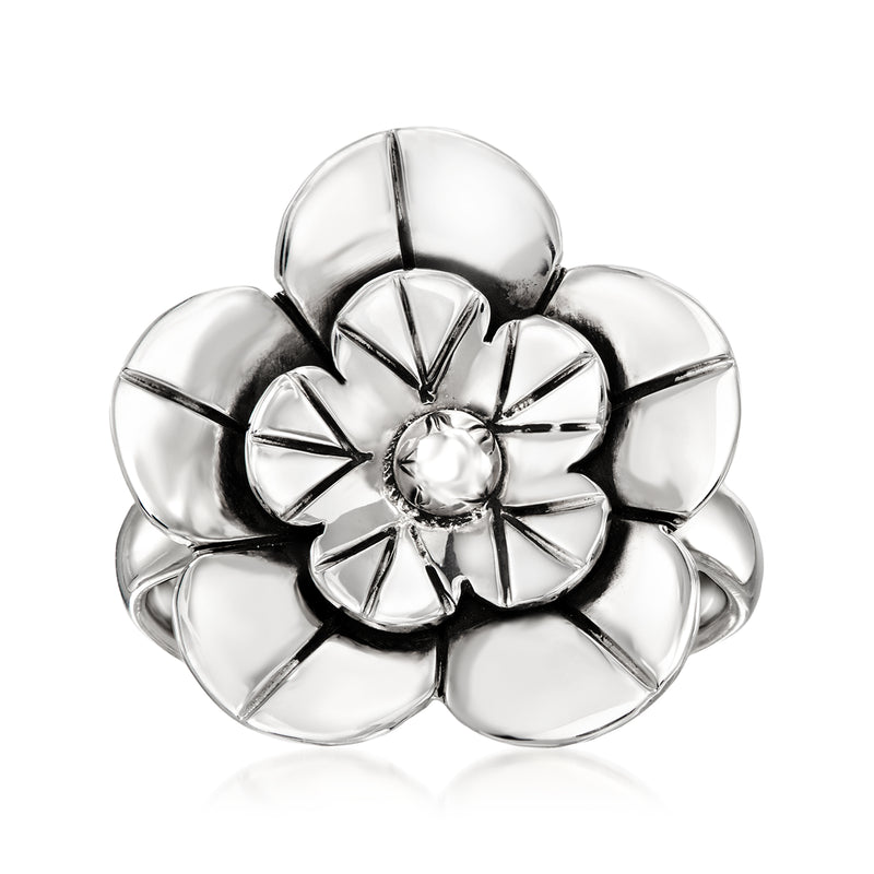Sterling silver flower ring with polished five-petal design and round center