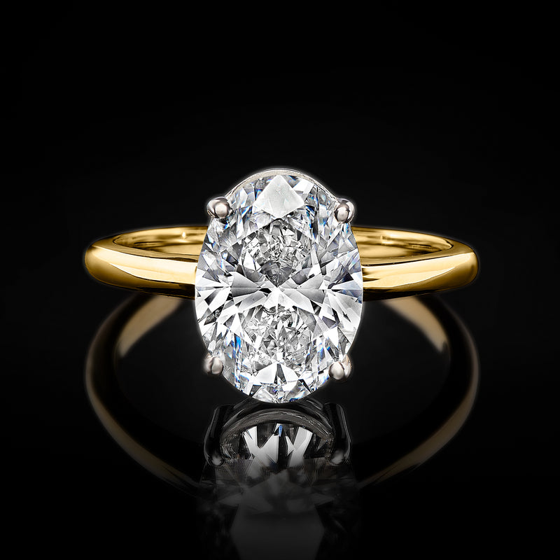 Oval lab-grown diamond solitaire ring in 14kt yellow gold, front view with four prongs