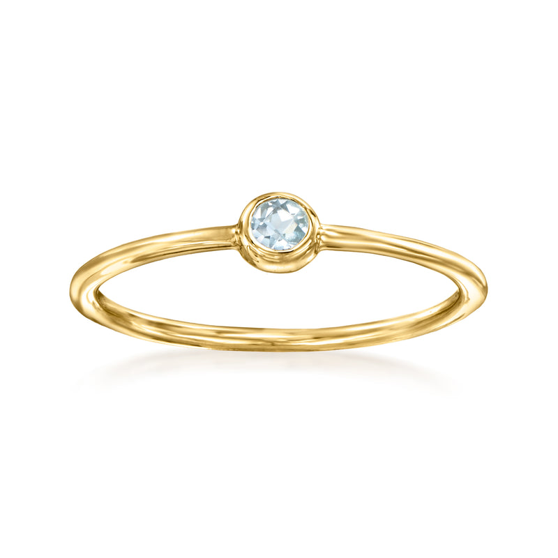 14kt yellow gold bezel-set aquamarine ring with round light-blue gemstone