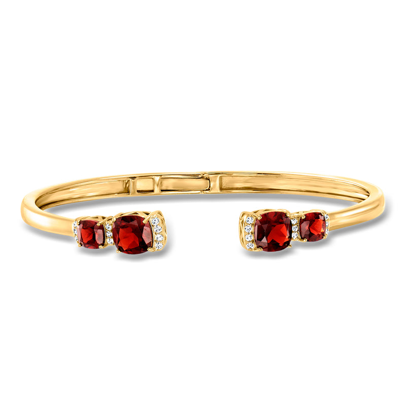 Gold cuff bracelet with red garnet and white topaz square accents