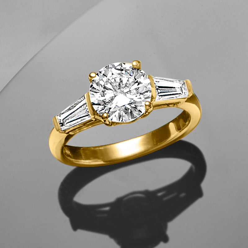 14kt yellow gold ring with round lab-grown diamond and angled baguette accents