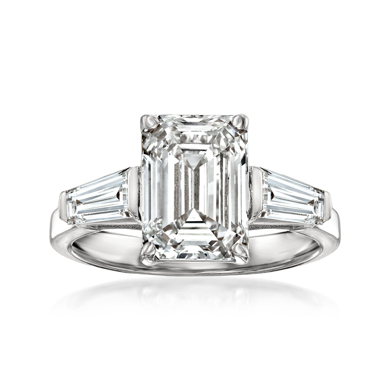 White gold lab-grown diamond ring with emerald-cut center and baguette side stones