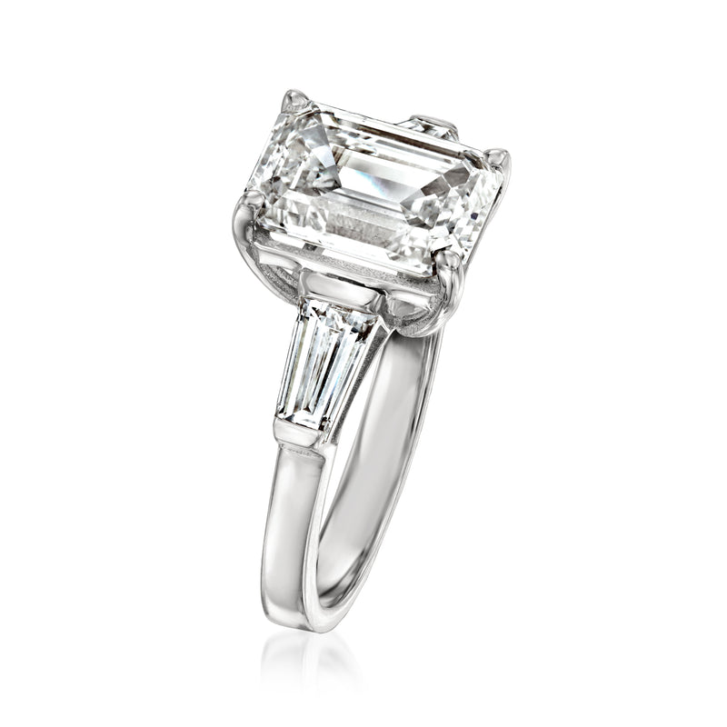 White gold lab-grown diamond ring angled view, emerald-cut center with baguette sides
