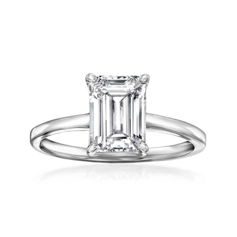 14kt white gold solitaire ring with emerald-cut diamond center in four-prong setting