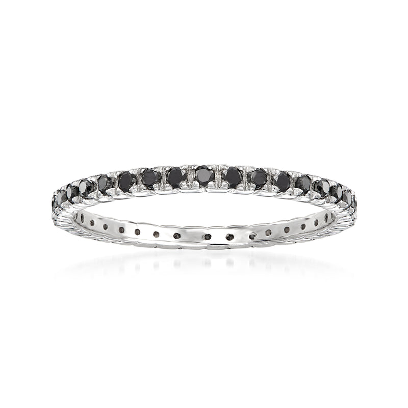 Sterling silver eternity band with small round gemstone settings around the band