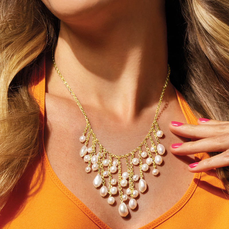 Gold fringe necklace with cultured pearl drops at the collar