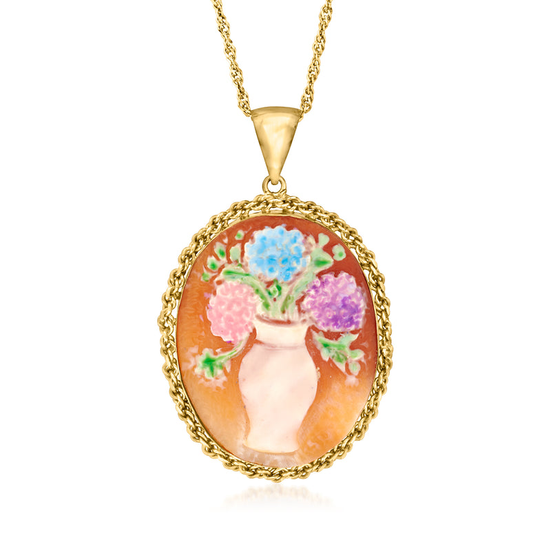 Gold-tone oval cameo pendant necklace with orange shell center and multicolored floral enamel.