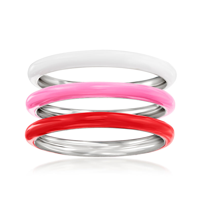 Three enamel rings in sterling silver, white, pink, and red stacked