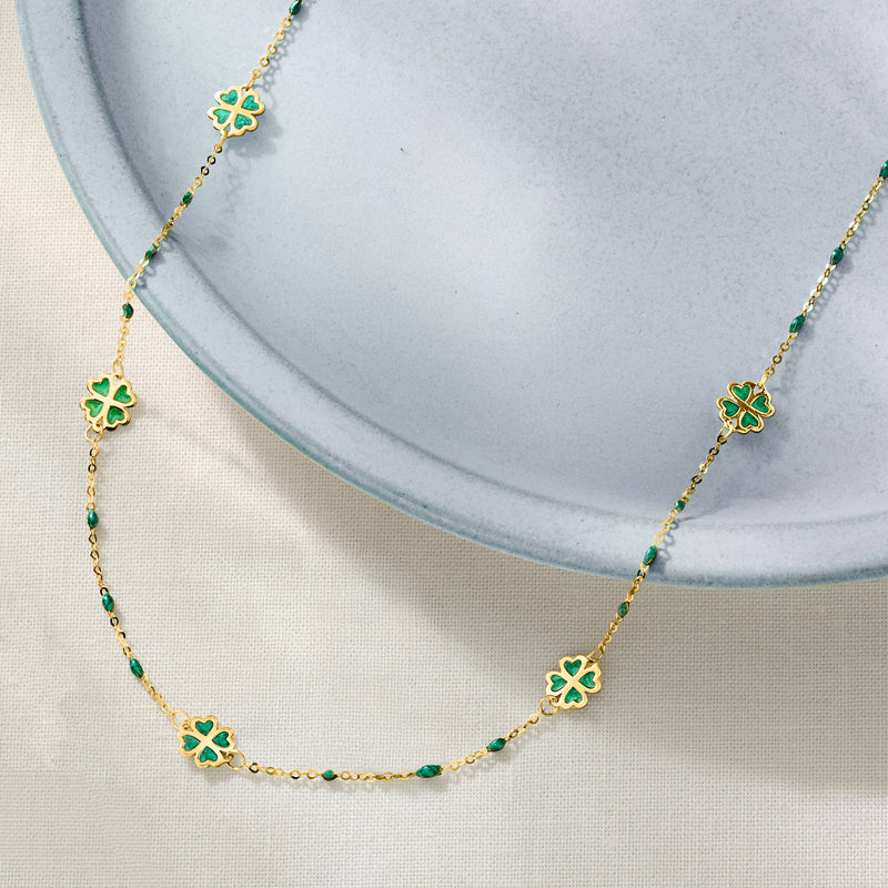 Clover station necklace in 14kt yellow gold with green enamel clover motifs