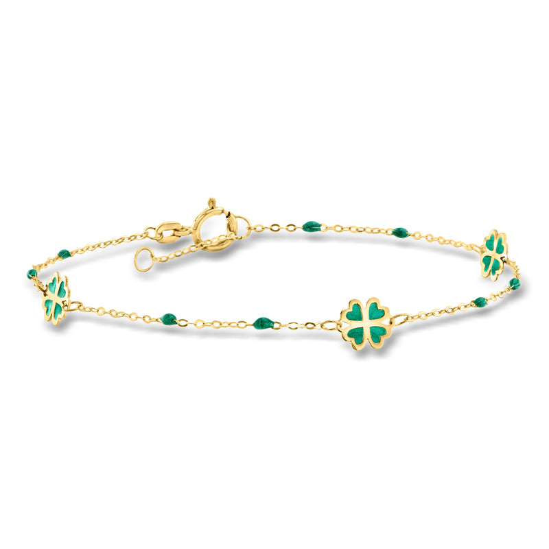 Gold bracelet with green enamel clover charms and chain stations