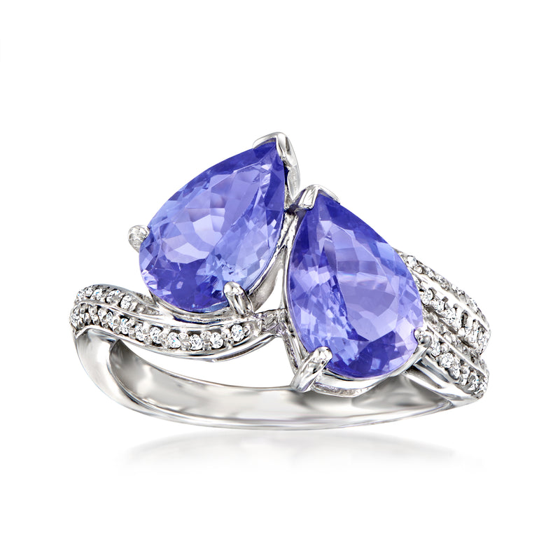 Tanzanite ring with pear-cut stones and diamond accents in 14kt white gold