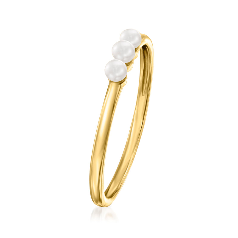 Slim 14kt yellow gold hoop ring featuring three white cultured pearls at side