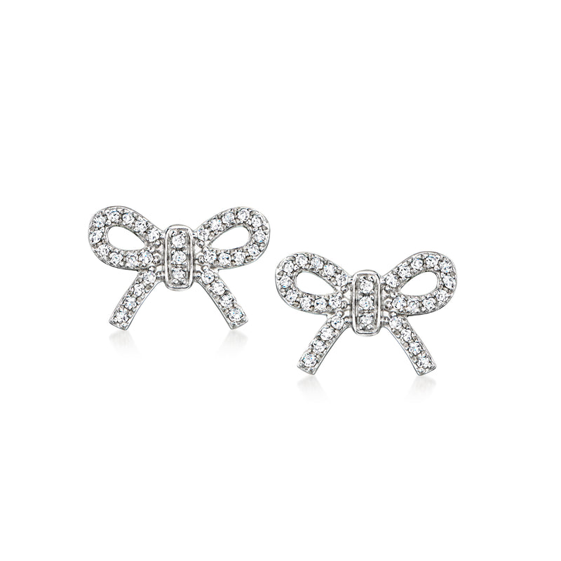 Sterling silver bow stud earrings with sparkling diamond accents, round stones.