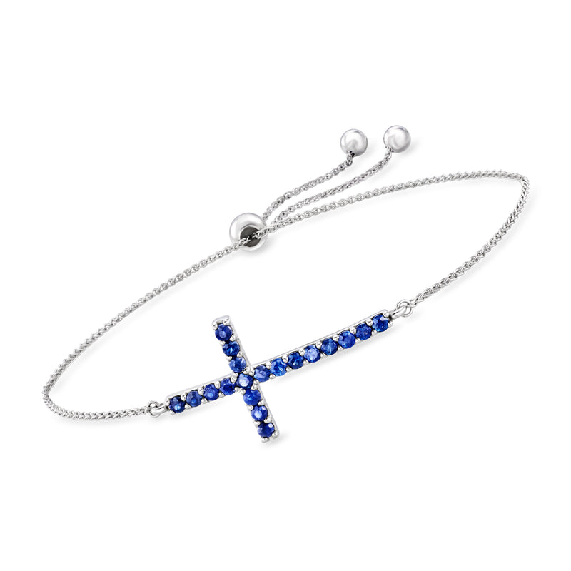 14kt white gold bolo bracelet with blue sapphire cross centerpiece