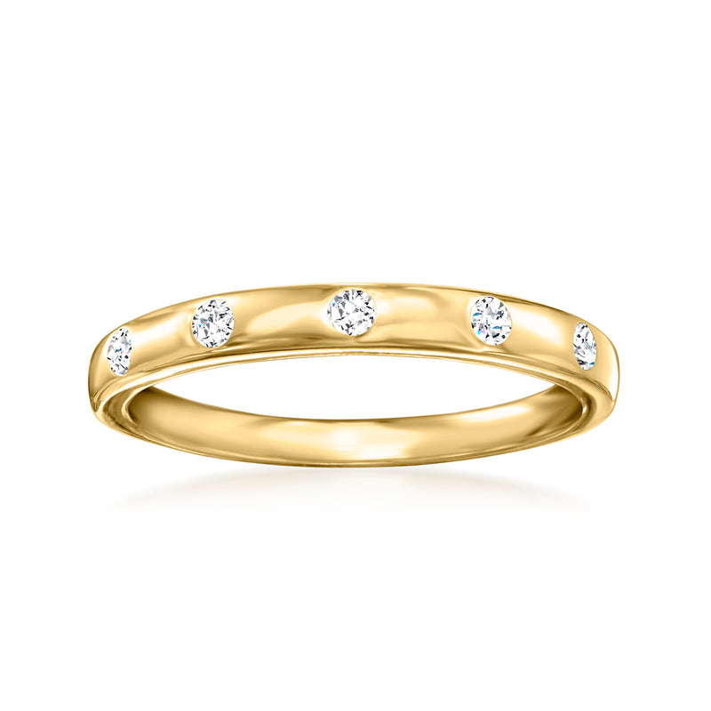 Gold diamond station ring with three round white stones across the top band