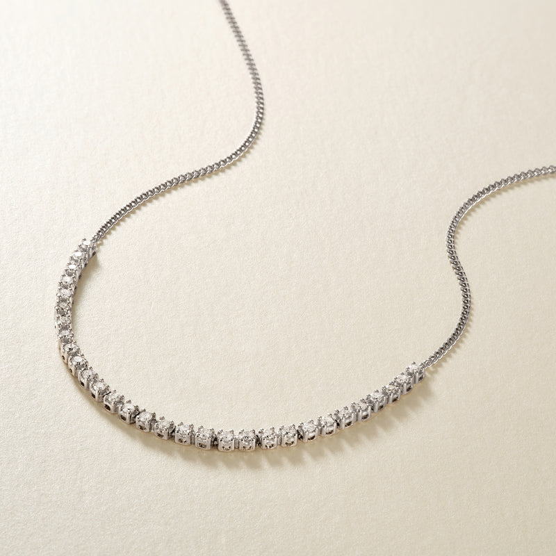 Diamond tennis-style necklace in sterling silver with row of round stones
