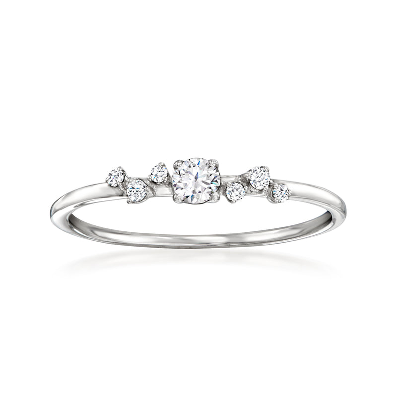 Sterling silver diamond scatter ring with round center stone and small side diamonds