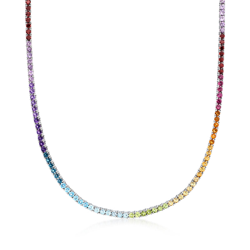Sterling silver tennis necklace with multicolor gemstone line along curved chain