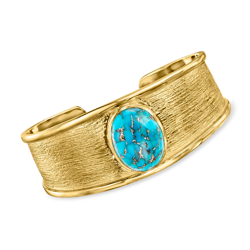 Turquoise oval cabochon cuff bracelet in gold-tone, textured metal band