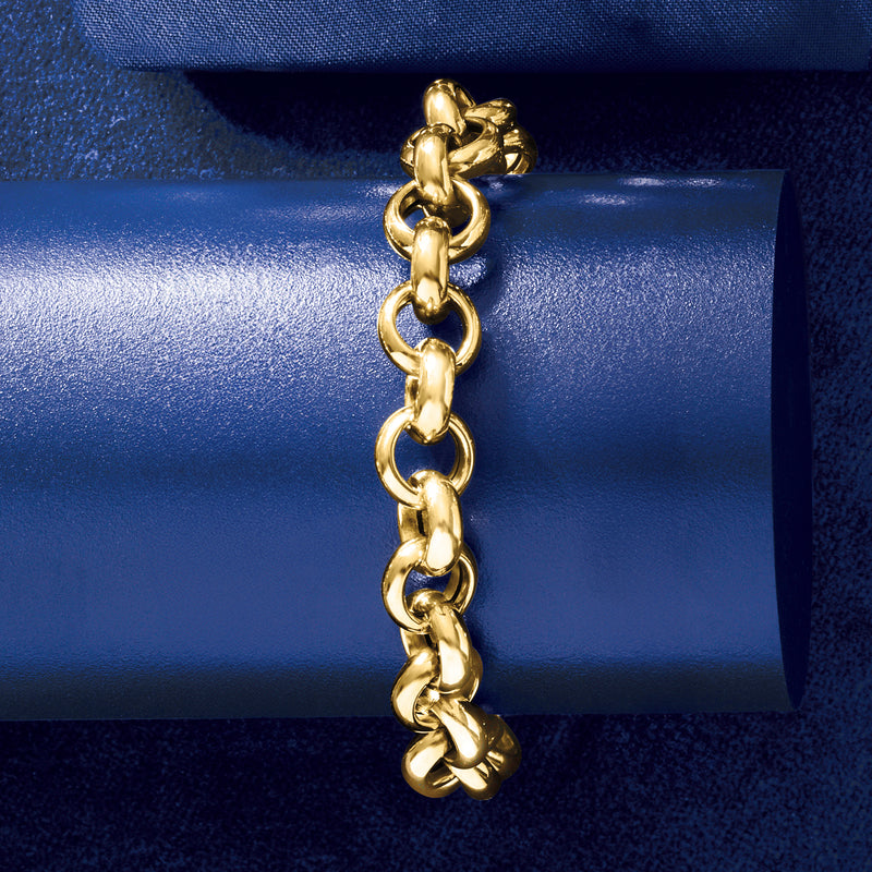 Close-up of yellow gold rolo-chain bracelet links with secure clasp