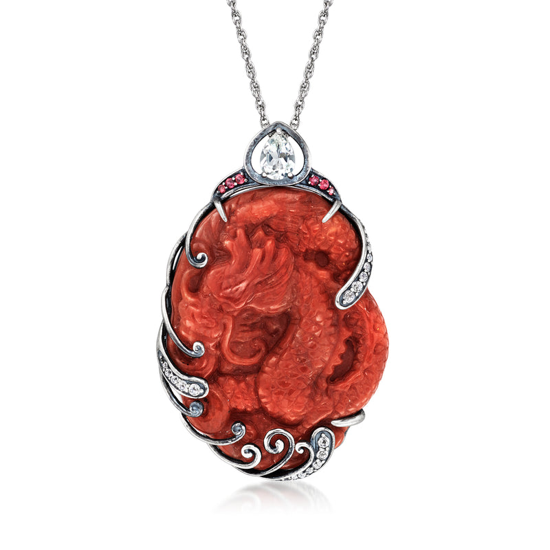 Sterling silver dragon pendant necklace with red gemstone and white accents, oval setting