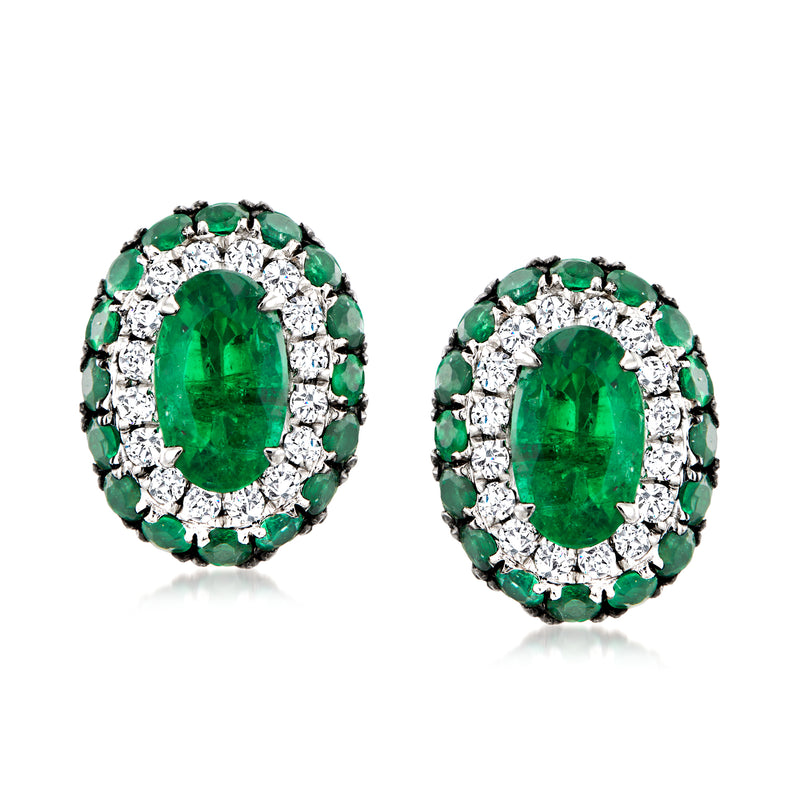 Oval green emerald stud earrings with diamond halo in 18k white gold posts