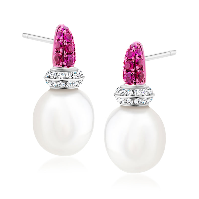 White gold post earrings with pink ruby tops, diamond band, and white round cultured pearls