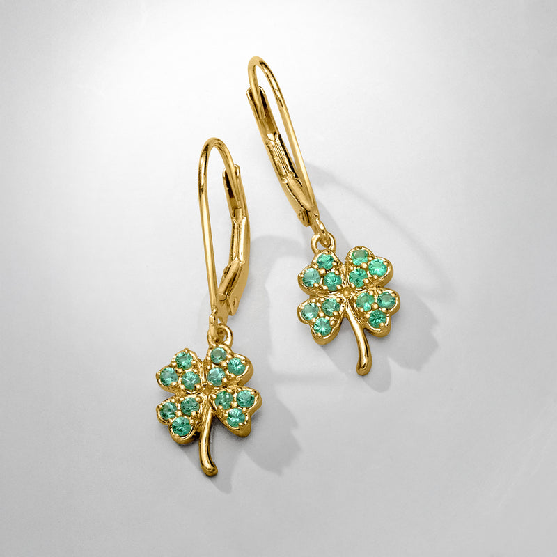 Four-leaf clover drop earrings with emerald-green stones, leverback, gold-tone, side view
