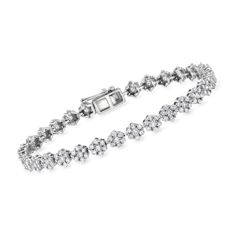 14kt white gold tennis bracelet with diamond floral clusters and square links