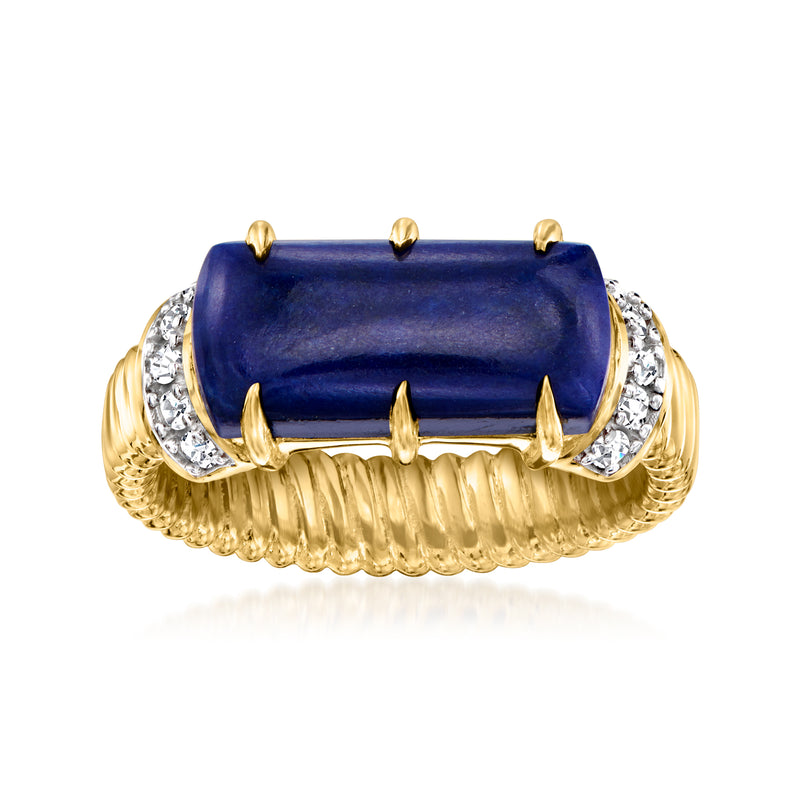 Gold ring with dark blue rectangular stone and white zircon halo accents