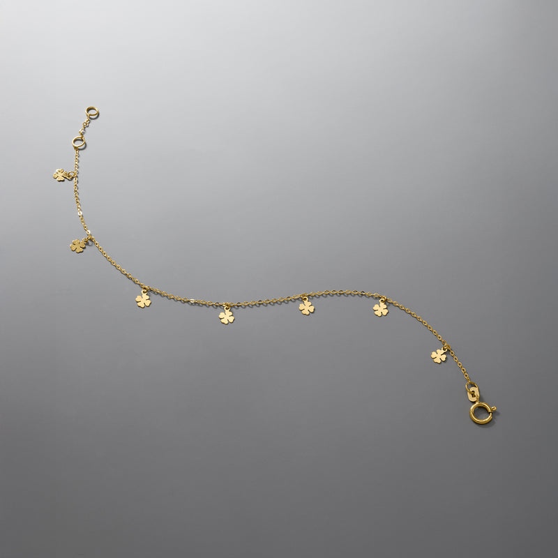 Yellow gold clover charm bracelet with station clovers and lobster clasp on chain