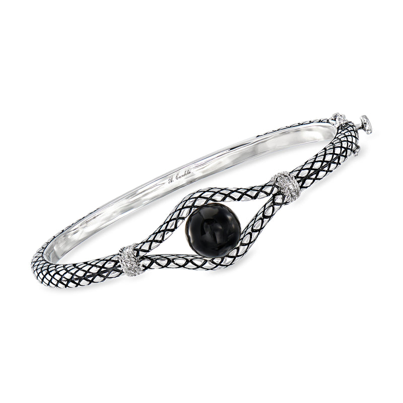 Sterling silver bangle bracelet with lattice black enamel and black oval center stone