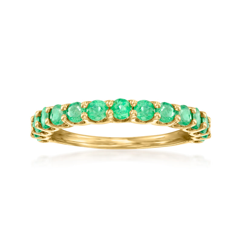 14kt yellow gold ring with round green gemstones set in a row