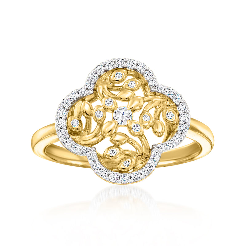 Gold diamond clover ring with flower-cut stones and round halo accents