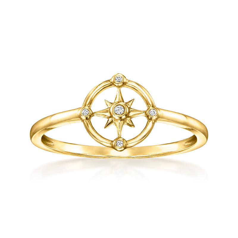 14kt yellow gold compass ring with diamond accents, star-like center and bezel settings.