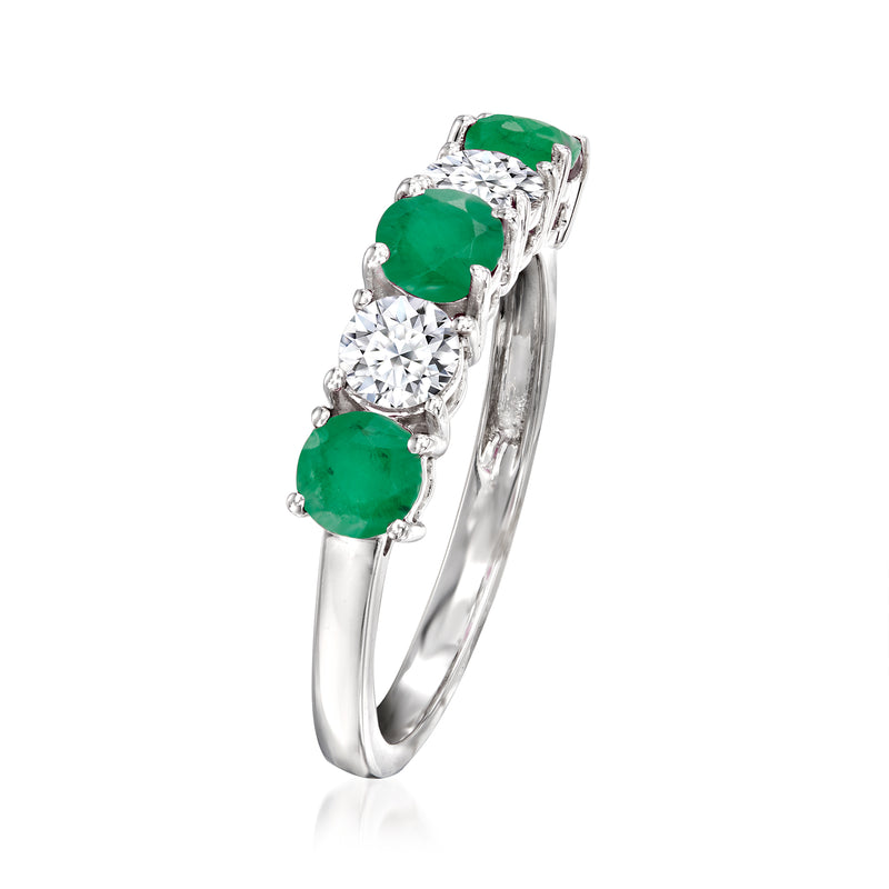 14kt white gold ring featuring emerald-green stones and round diamond clusters