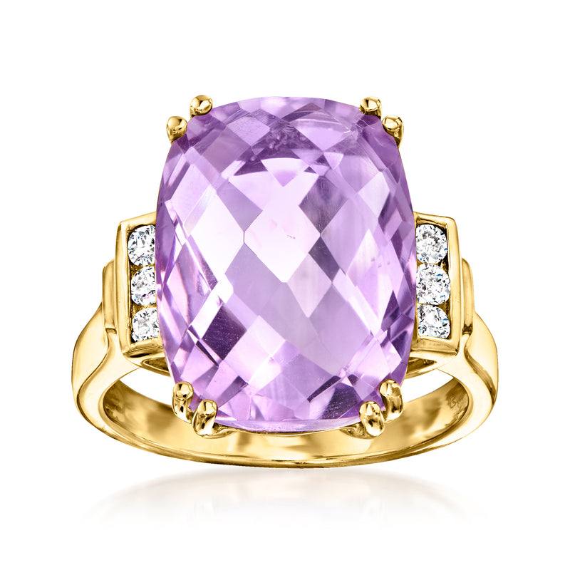 14kt yellow gold ring with oval amethyst center and diamond side stones