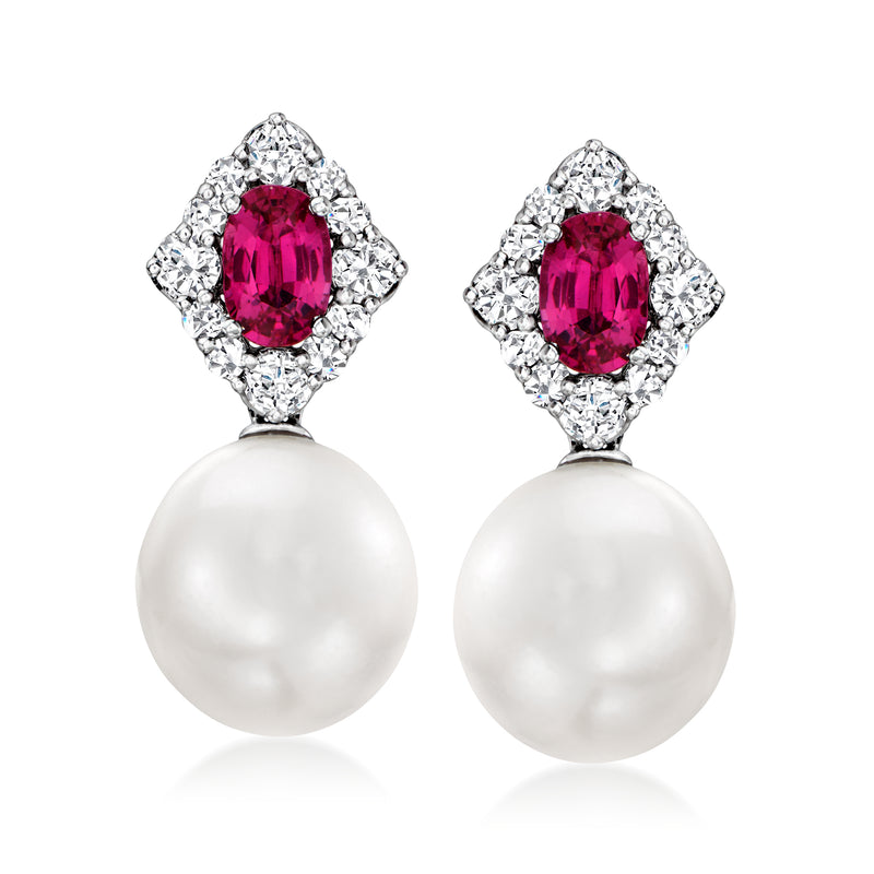 18kt white gold drop earrings with white pearl, ruby center, diamond halo